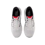 Championes de running New Balance modelo Fresh Foam X 880v12, color azul con detalles en gris, blanco y verde.