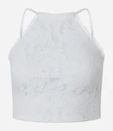 Blusa cropped blanca de encaje con cuello halter, breteles finos con lazo en la espalda y lastex en la espalda.