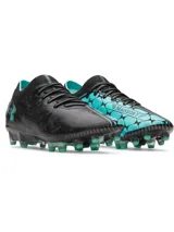 Championes de fútbol Under Armour Magnetico Elite, color negro con detalles en turquesa.