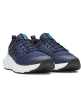 Championes de entrenamiento Under Armour Charged Commit TR 4, color azul marino con logo en negro y suela blanca.