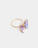 Anillo dorado con dos mariposas de strass tornasol.