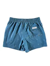 Short de baño blanco con estampado de hojas de palmera en tonos verde, rojo y amarillo.