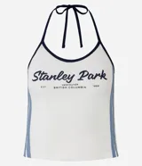 Top frente única color crema con estampado de texto "Stanley Park" en azul marino y ribetes negros.