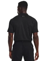 Remera polo Under Armour Matchplay para hombre, color gris jaspeado con logo negro en el pecho.
