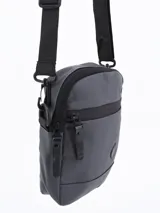 Morral bandolera negro con cierre superior y bolsillo frontal con cierre.