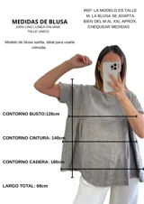 Blusa de lino 100% color blanco roto, de corte holgado y manga corta.