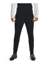 Pantalón deportivo Under Armour Challenger de hombre, color gris con detalles en naranja y logo de la marca en blanco.