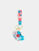 Llavero con forma de cámara de fotos azul y roja con strap de silicona con la palabra "Sweet" en letras blancas. Proyecta imágenes (luz y sonido).