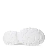 Zapatillas deportivas color beige con plataforma gruesa y acordonadas.