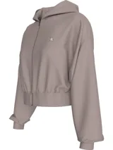Buzo cropped con capucha y cremallera frontal, color gris topo, con logo CK bordado en el pecho.