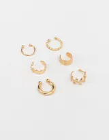 Set de seis cuffs dorados con diferentes diseños.