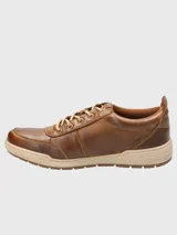 Championes de cuero color marrón con cordones, plantilla Smart Foam® y suela de goma.