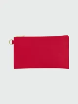 Pochette Longchamp modelo Le Foulonné, color naranja, con cierre superior y logo grabado en el frente.