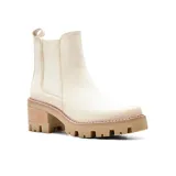 Botas Chelsea color hueso, con elásticos laterales, suela track y tacón bloque de madera.