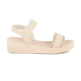 Sandalia casual beige con plataforma baja y tiras con detalles de costuras en contraste.