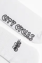 Medias blancas de caña alta acanalada con estampado de bicicleta y texto "City Cycles".
