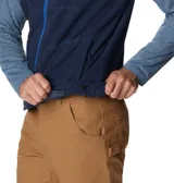 Chaleco de polar Columbia Fast Trek para hombre, color azul marino con cierre y detalles en azul eléctrico. Cuenta con cuello alto, bolsillos laterales con cierre y bolsillo en el pecho con cierre.