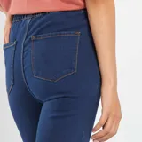 Jegging azul de talle alto con cintura elástica y diseño ajustado.