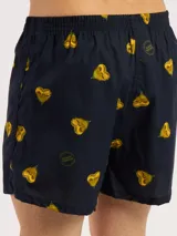 Bóxer de algodón blanco con estampado de flores pequeñas color celeste, con cintura elástica y logo de la marca en el centro.