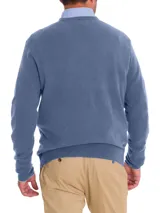 Sweater azul de cashmere con cuello en V y borde en contraste.