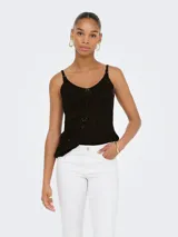 Top negro de tejido de punto con escote en V y tirantes finos regulables.