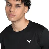 Remera deportiva Puma color negro, de corte clásico, con logo estampado en el pecho.