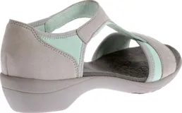 Sandalias Hush Puppies color gris con detalles en verde agua, con suela liviana y flexible.