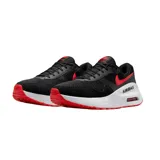 Championes Nike Air Max Systm negros con detalles en rojo y blanco.