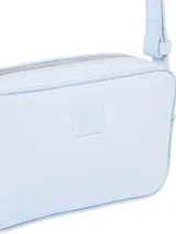 Bandolera Tommy Jeans Essential Convertible color celeste, con correa ajustable y logo de la marca en el frente.
