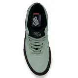 Championes de skate Vans modelo Half Cab, caña media, en color verde menta con suela y cordones negros. Presenta el parche 'Half Cab' en el lateral.