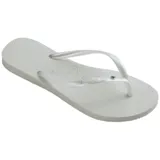 Ojotas Havaianas Slim Crystal Swarovski II, color blanco, con tiras finas y aplique de cristal Swarovski.