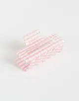 Broche para el pelo tipo pinza, de plástico transparente con diseño a cuadros rosas y blancos.
