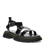 Sandalias negras con plataforma, tiras anchas con hebillas plateadas y ajuste con velcro en el tobillo.