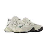 Championes urbanos New Balance modelo 9060, color verde azulado con detalles en blanco, confeccionados en gamuza y malla, con logo "N" característico en los laterales y entresuela con tecnología ABZORB y SBS.