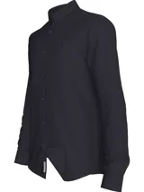 Camisa de vestir azul marino, corte slim, con cuello abotonado, cierre con botones y mangas largas. Presenta un mini monograma bordado en el pecho y logo de Calvin Klein Jeans en la parte inferior.