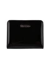 Monedero pequeño color dorado, con textura símil cuero y logo de la marca Terrano en el frente.