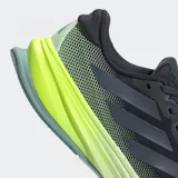 Championes Adidas Supernova Rise 2 color negro con detalles en verde y gris. Ideales para running, con entresuela Dreamstrike+ y suela Adiwear.