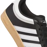 Championes Adidas Hoops 4.0 de corte bajo, color negro con detalles plateados y suela marrón.