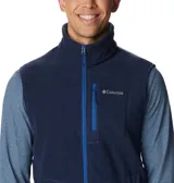 Chaleco de polar Columbia Fast Trek para hombre, color azul marino con cierre y detalles en azul eléctrico. Cuenta con cuello alto, bolsillos laterales con cierre y bolsillo en el pecho con cierre.