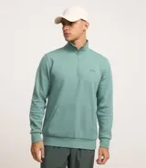 Buzo deportivo verde agua para hombre, confeccionado en algodón y poliéster. Cuenta con cuello alto con cremallera, manga larga con ajustes, bolsillo canguro y doble tejido interno.