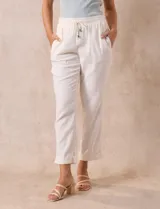 Pantalón de lino color blanco, marca Cable & Gauge, con pretina ancha elastizada, lazo de ajuste, bolsillos delanteros y ruedo con botamanga.