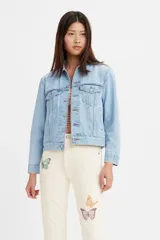 Chaqueta de mezclilla de corte extragrande, con dobladillo alargado, diseñada para un look relajado.