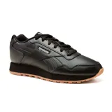 Championes Reebok Glide color negro, de estilo casual y deportivo. Confeccionados en cuero sintético con detalles de costuras y logo de la marca en el lateral. Suela de goma color caramelo.