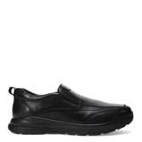 Zapato de vestir negro de cuero, sin cordones, con elásticos laterales y suela gruesa.