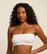 Soutien strapless blanco de poliamida seamless, sin relleno ni aro.