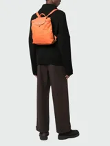 Mochila Longchamp modelo Le Pliage Green M, color naranja.