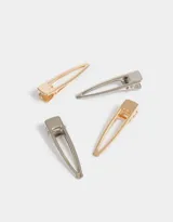 Set de cuatro hebillas para el pelo tipo pico de pato, dos doradas y dos plateadas.