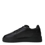 Championes urbanos Puma Shuffle Downtown, color blanco con detalles en negro y dorado, con logo Puma en el lateral y talón en contraste.