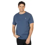 Remera de manga corta color azul oscuro, con cuello redondo y un pequeño logo de Volcom bordado en el pecho.