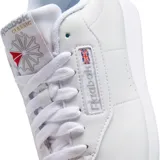 Championes Reebok Princess de cuero blanco, con logo de la marca en rojo y azul.